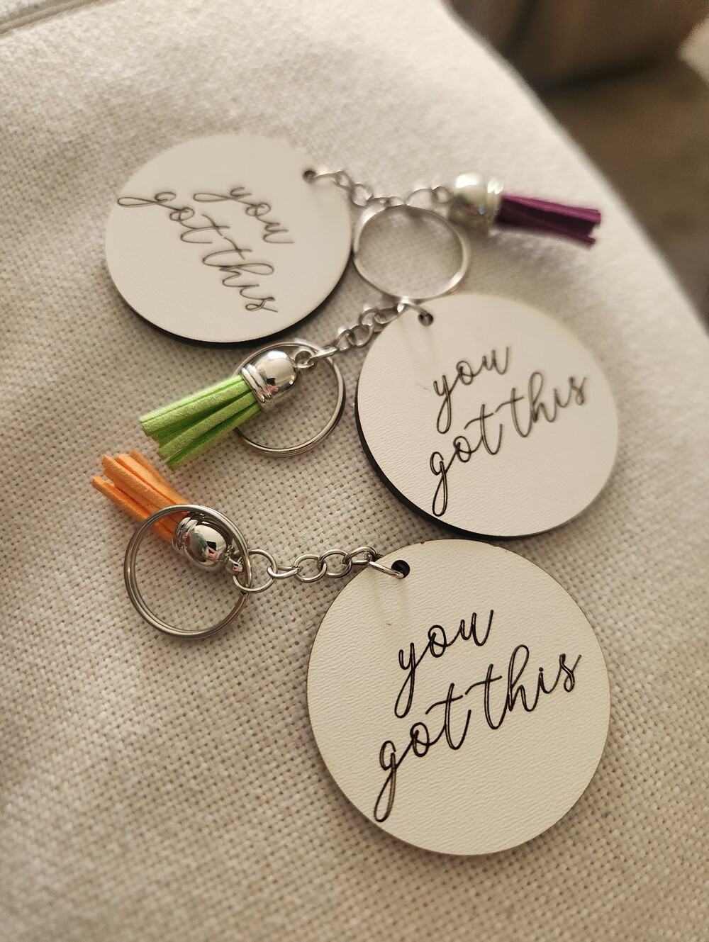 Round "You Got This" White Keychain with Colored Tassel